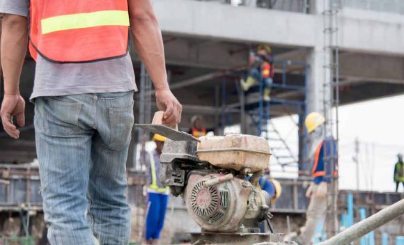 Team Of Construction Worker In Safety Standard Uniform